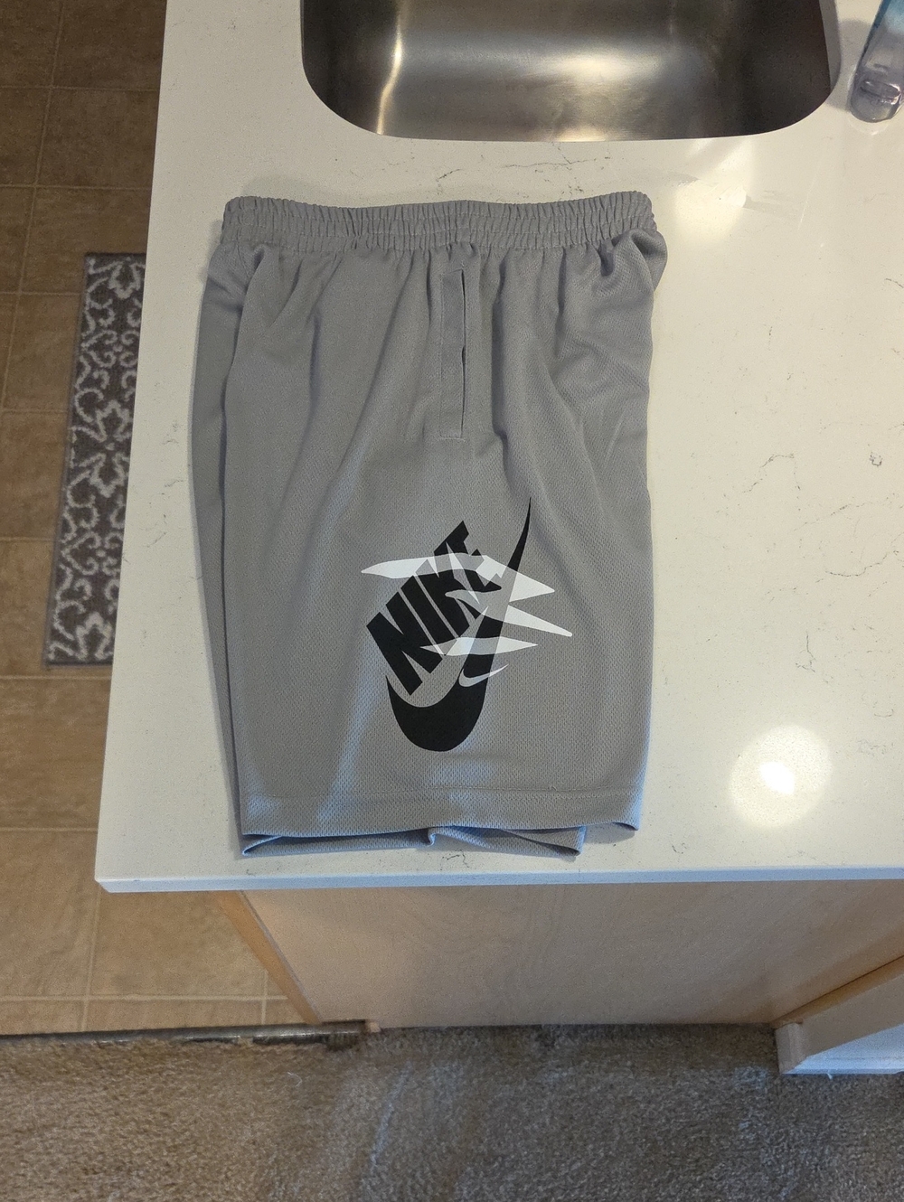 Nike Kids Light Gray Athletic Mesh Shorts with Black Logo